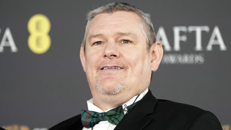 John Davidson, who vocalized the N-word during the BAFTAs, is asking why he was seated by a microphone