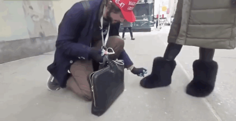 New York man arrested after calling woman N-word and setting her boots on fire