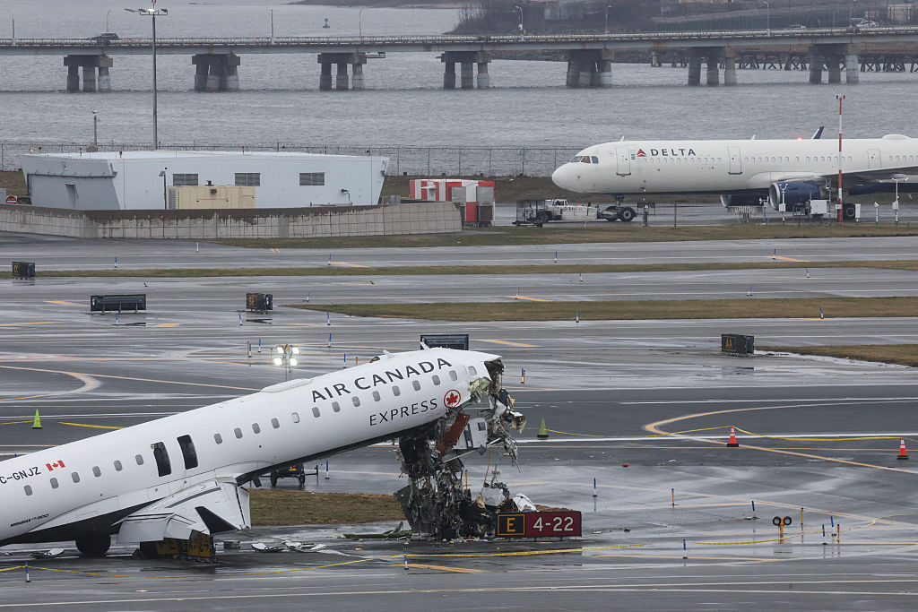 Plane Crash At LaGuardia Airport Kills Pilots, Injures 41 Others