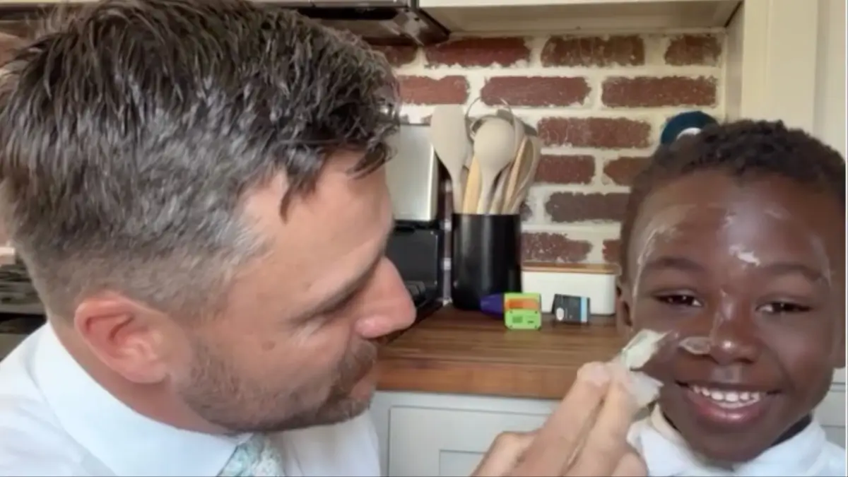 ‘Disturbing to Watch’: White Dad Influencer Smears Vaseline Into Adopted Black Son’s Face Inciting Controversy and Fierce Debate Online