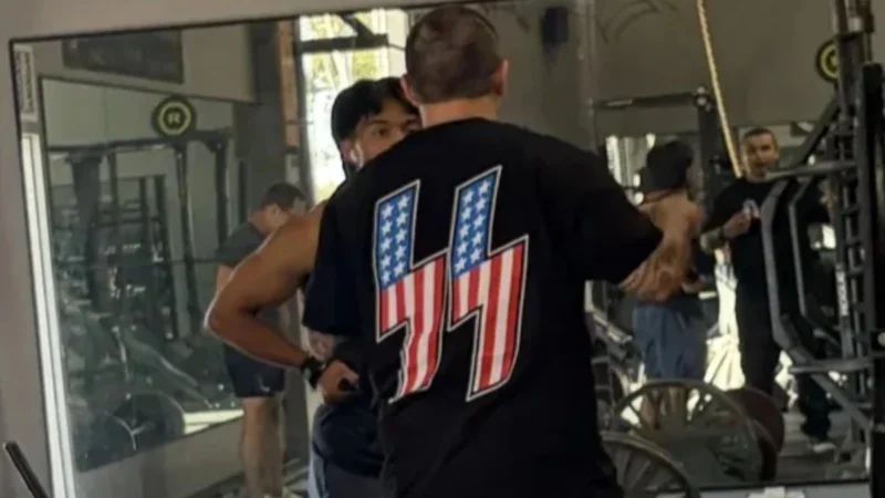 ‘Oh He Knew’: California Gym Owner Proudly Wears Shirt with Racist Symbol—Then Claims He Had No Idea What It Meant After Negative Reviews Start Pouring In