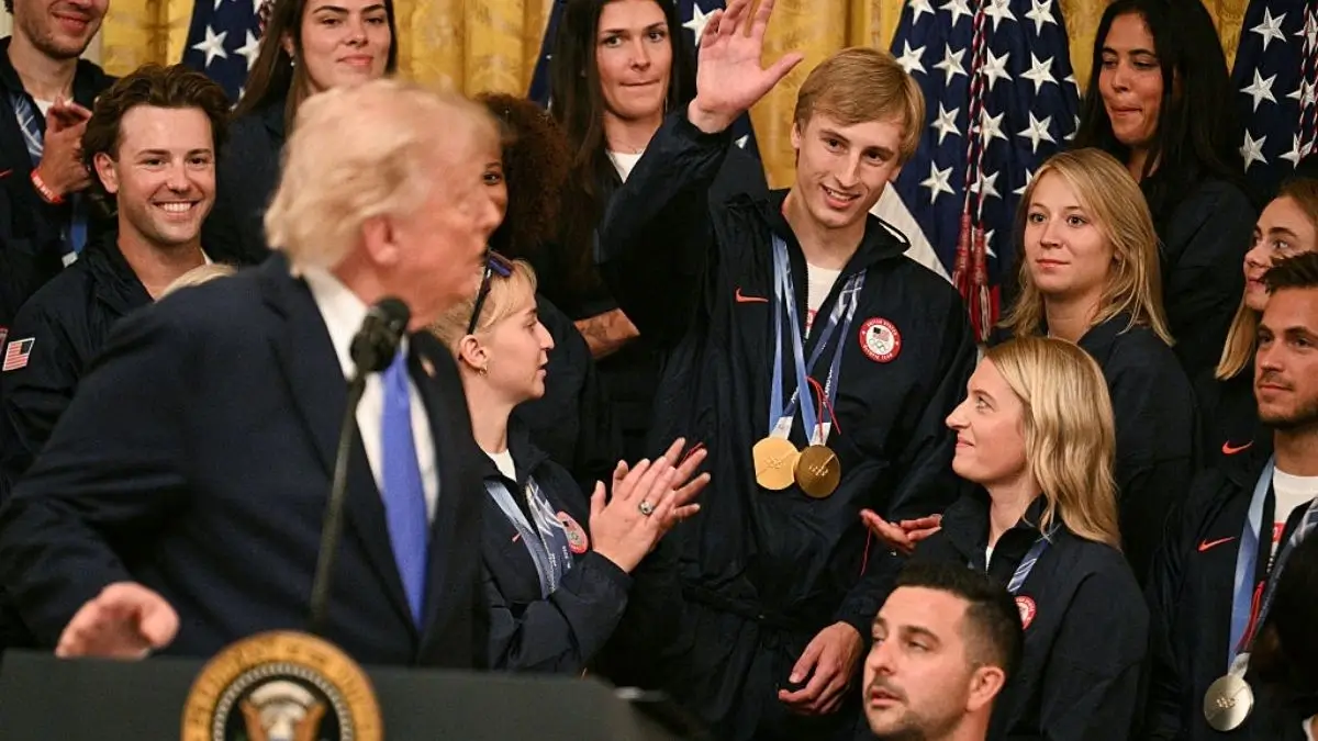 ‘She Knows’: Team USA Gives Trump the Royal Treatment—Then He Unloads One Wild Promise and a Cutting Insult as Woman Behind Him Can’t Hide Her Reaction 