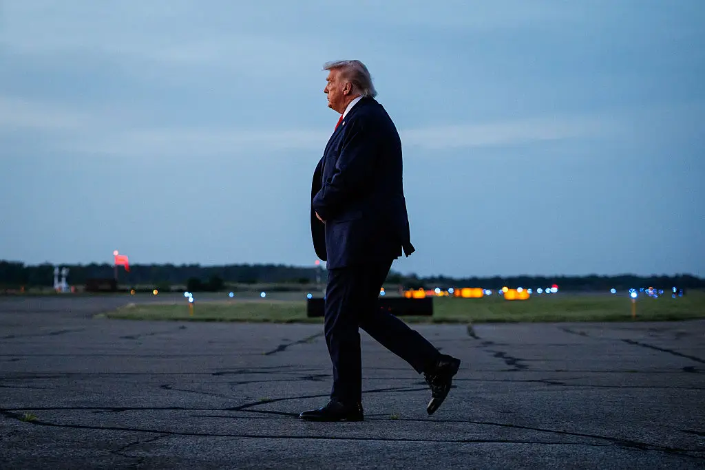 ‘Looks Like He’s Gonna Fall’: Trump Struggles Across the Rainy Tarmac as Cameras Zoom In on Every Careful Movement