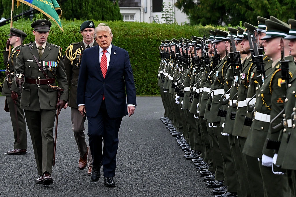 ‘He Doesn’t Know it’s Broken’: Trump Tries To Power Walk Past Irish Troops But Fans Zoom In On Something Off With His Shoe And His Left Leg