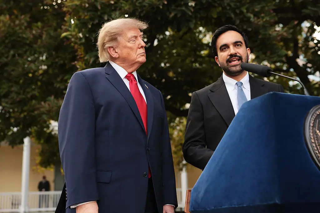 ‘Creepy’: Trump Gets Told to Leave Mayor Mamdani’s Presser, Won’t Budge — Then Lurks Over His Shoulder as Reporters Pretend He’s Not There